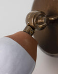 Cathán Adjustable Ceramic Wall Sconce